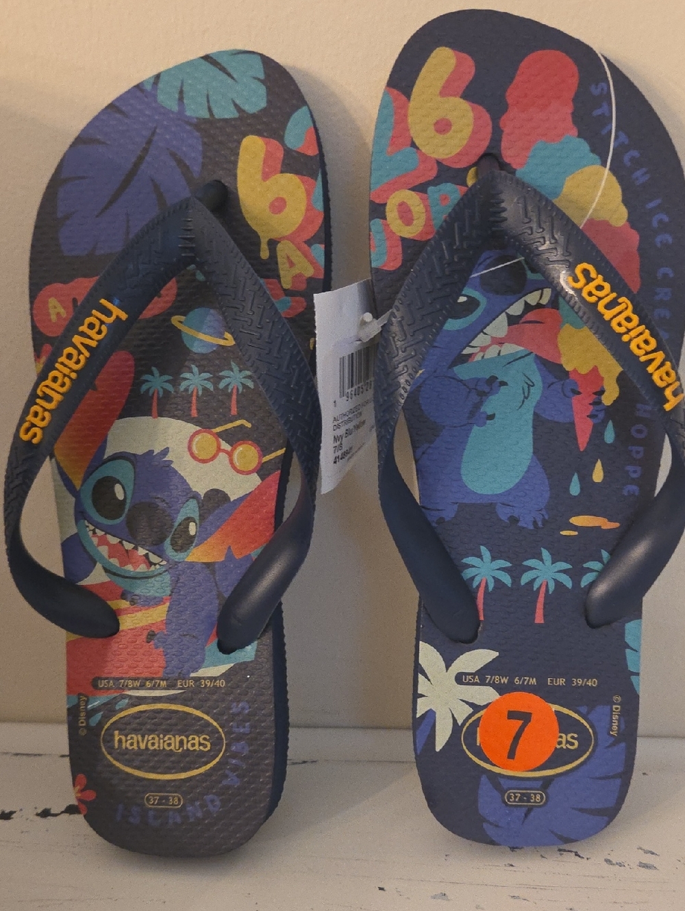 Havaianas Women's Navy Flip Flops with Colorful Stitch Graphic